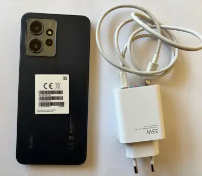 Smartphone Xiaomi redmi 12 con cargador original - miniatura 2