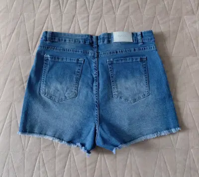Falda-short de mezclilla azul desgastado - miniatura 2