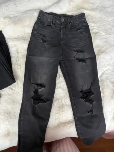 Jeans negros desgastados para mujee - miniatura 1