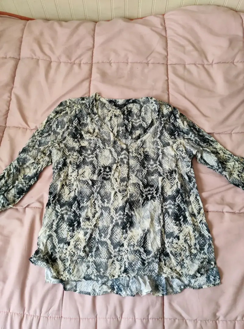 Blusa estampado animal print manga larga