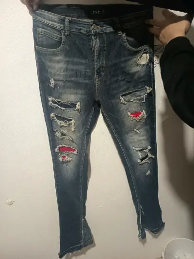 Jeans desgastados con roturas estilo casual - miniatura 2