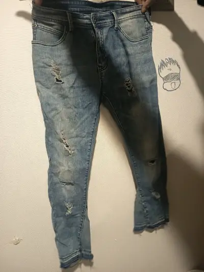 Jeans desgastados de mezclilla azul - miniatura 1