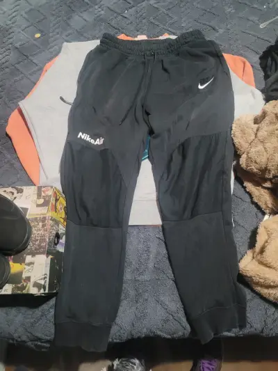 Pantalones deportivos Nike Air negros - miniatura 1