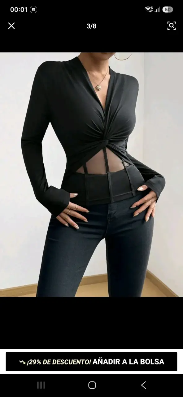 Top negro con diseño cruzado y transparencias - 3