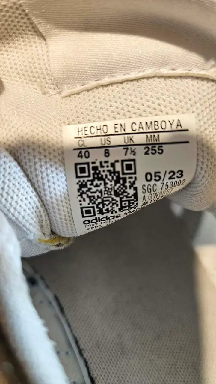 Zapatillas deportivas blancas con rayas azules - 4
