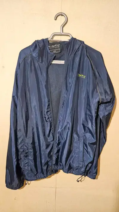 Cortaviento azul NIMTU para hombre - miniatura 1