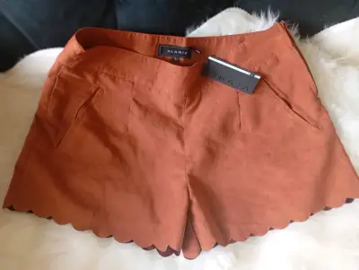 Shorts Alaniz color terracota con borde ondulado - miniatura 1