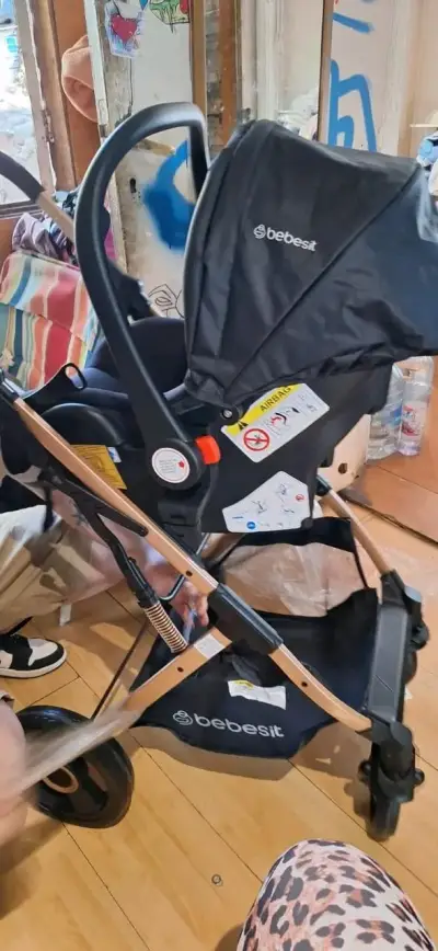 Coche de bebé con silla de auto, marca Bebesit - miniatura 1