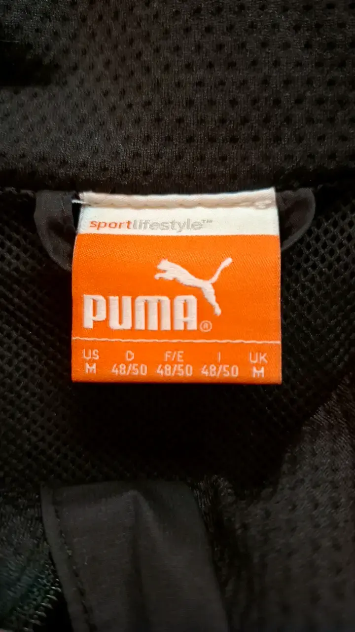 Chaqueta deportiva Puma negra con detalles blancos - 3