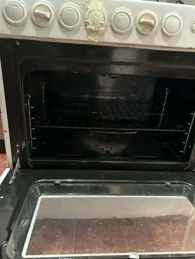 Cocina a gas con horno usada - miniatura 2