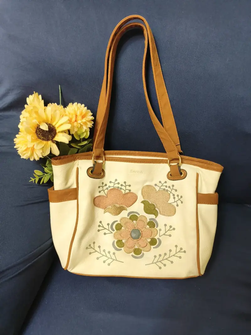 Bolso Danna beige con diseño floral