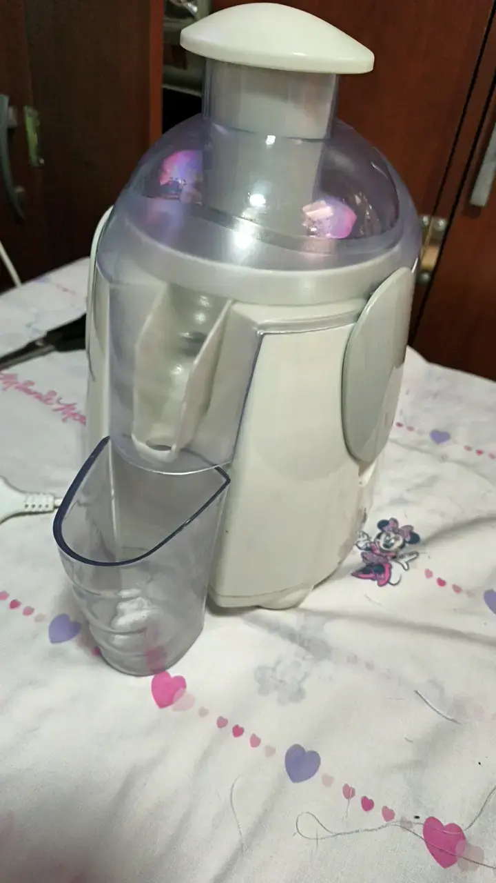Extractor de jugos eléctrico compacto - 1