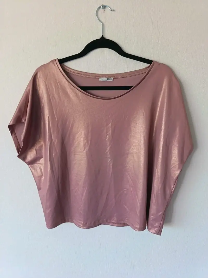 Polera metálica rosa para mujer