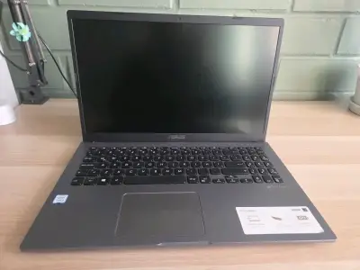 Laptop ASUS con procesador Intel Core i3 - miniatura 1