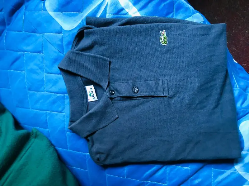 Polera polo Lacoste azul oscuro
