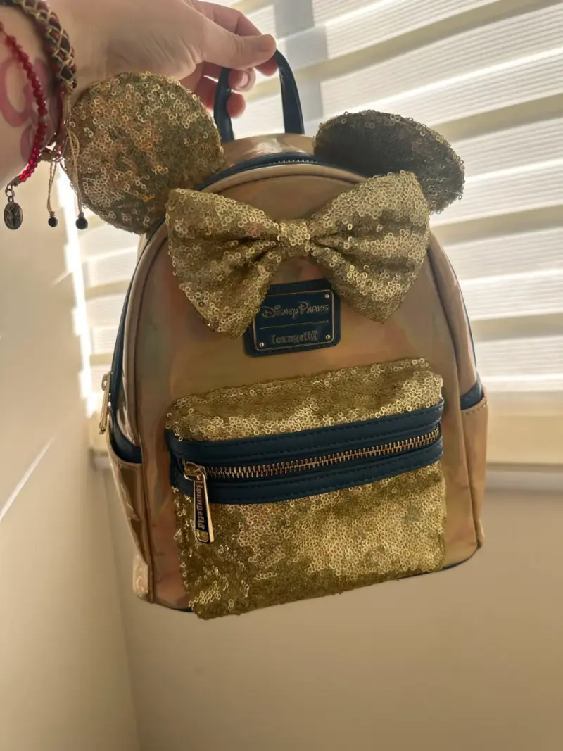 Mochila Loungefly Disney dorada con lentejuelas