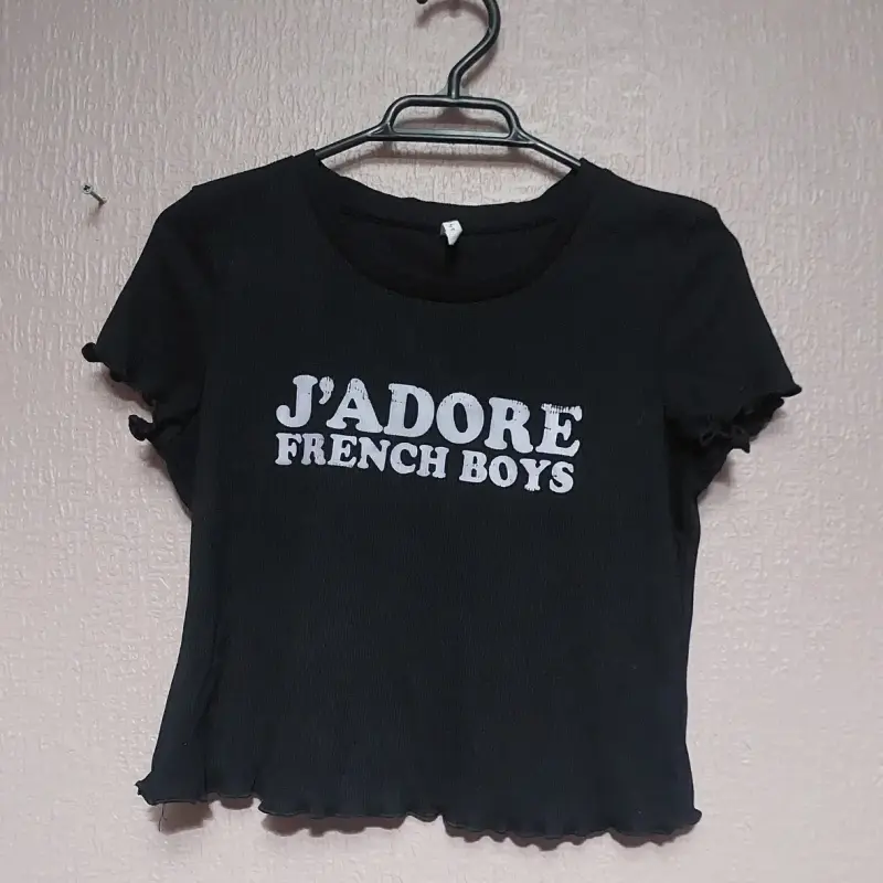 Polera negra con estampado 'J'adore French Boys'