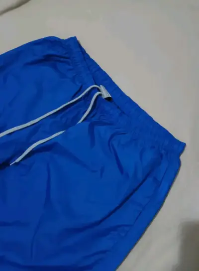Pantalón cortavientos azul - miniatura 2