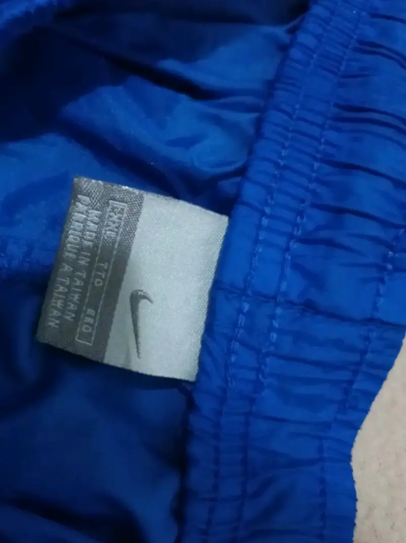 Pantalón cortavientos azul - 4