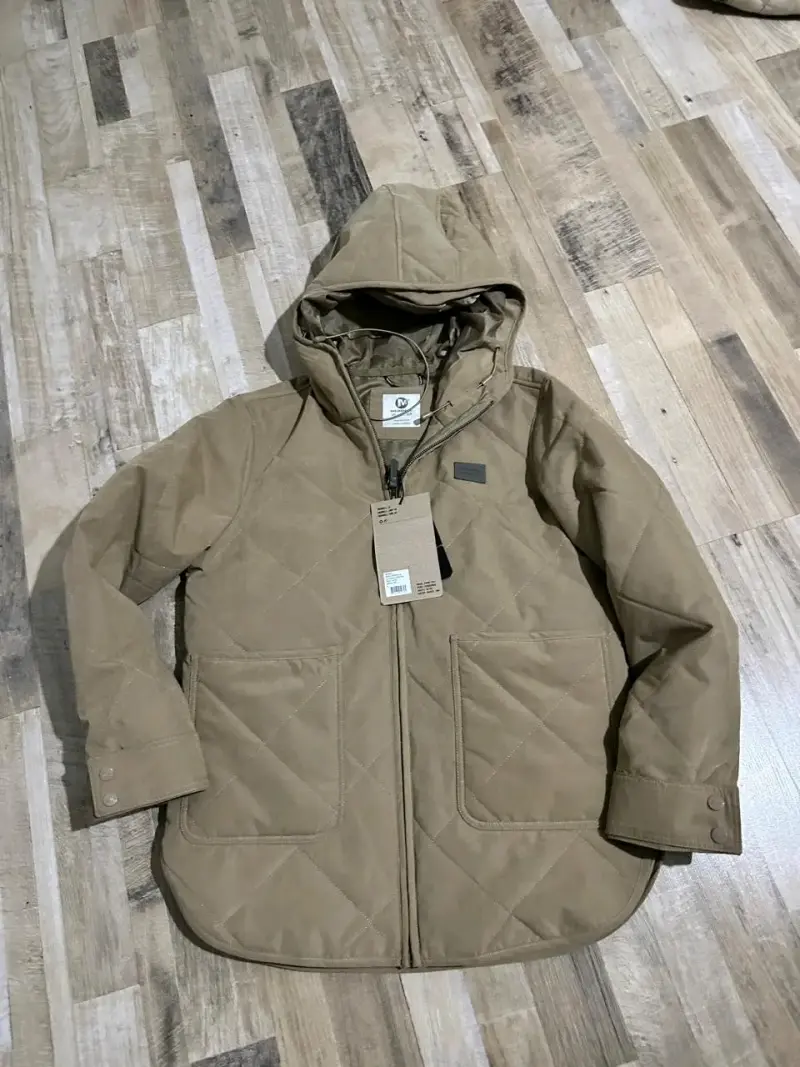 Parka acolchada beige con capucha - 1