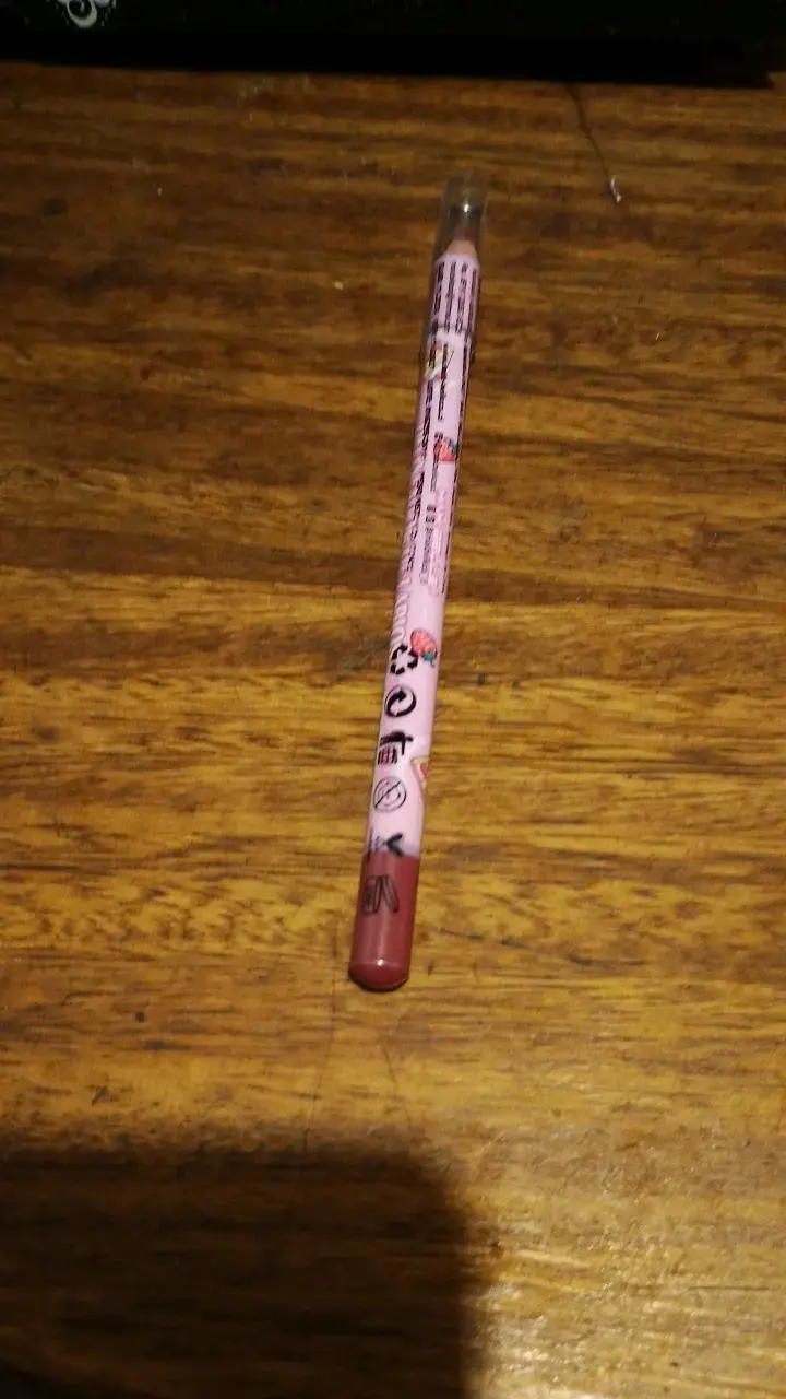 Lápiz labial en lápiz color rosa