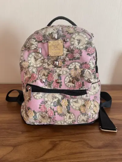 Mochila estampada con relojes y flores - miniatura 1