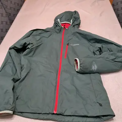 Chaqueta impermeable Columbia verde con capucha - miniatura 1