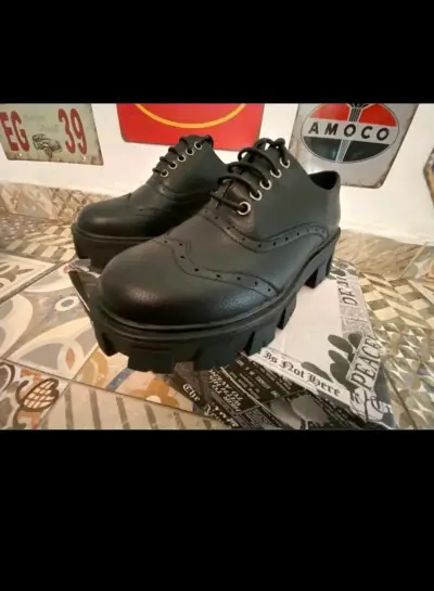 Mocadines negros de cuero con plataforma - miniatura 4