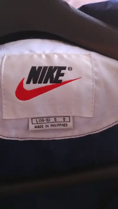 Cortaviento Nike azul marino unisex - miniatura 5