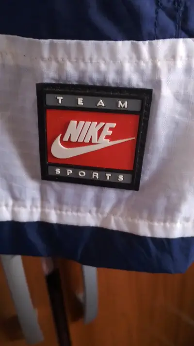 Cortaviento Nike azul marino unisex - miniatura 6
