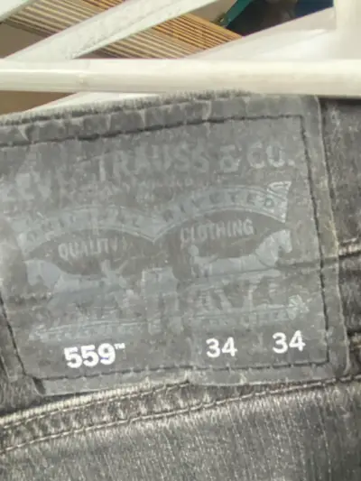Jeans gris oscuro para hombre en buen estado - miniatura 3