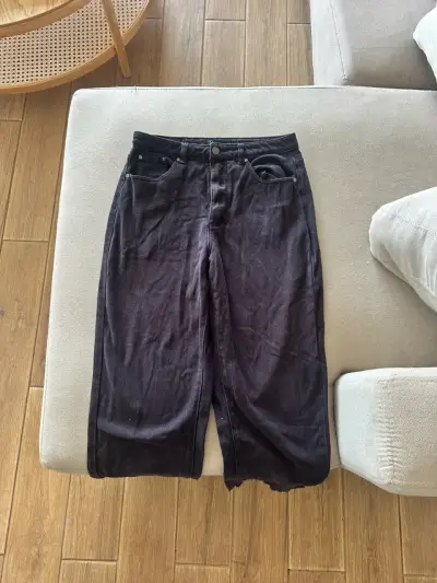 Jeans negros unisex en buen estado - miniatura 1