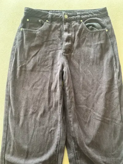 Jeans negros unisex en buen estado - miniatura 3