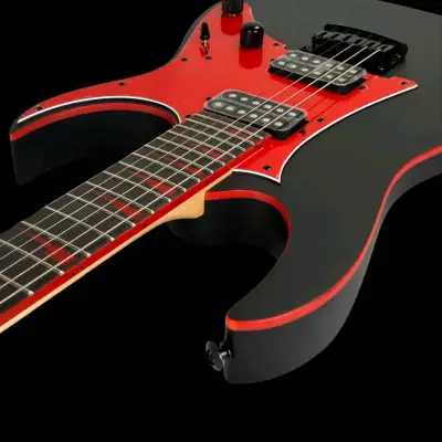 Guitarra eléctrica negra con detalles rojos - miniatura 4