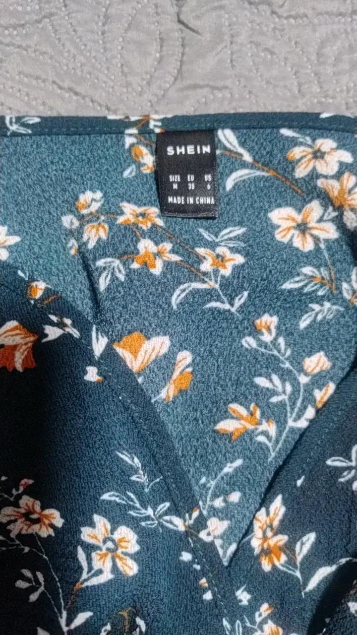 Enterito floral azul con diseño elegante - 2