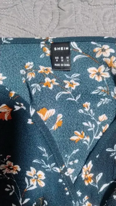 Enterito floral azul con diseño elegante - miniatura 2