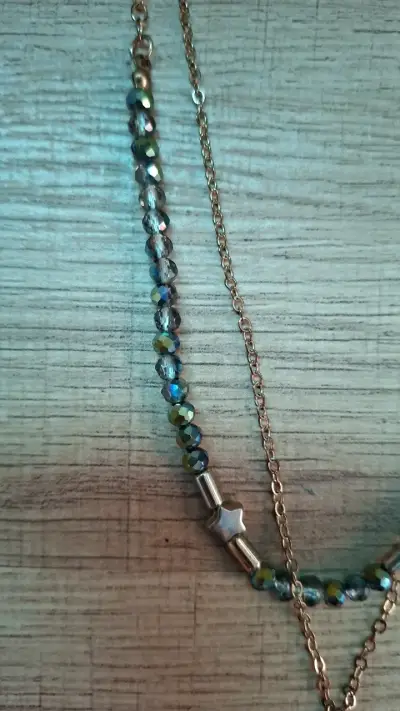 Collar doble con dije de sol y luna - miniatura 3