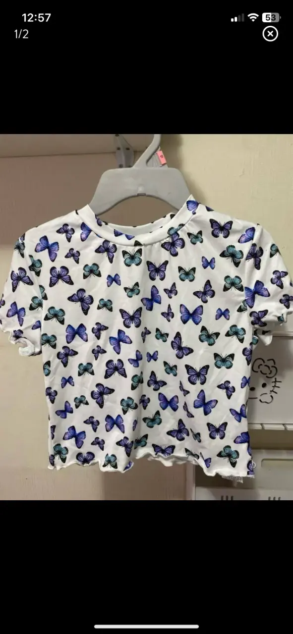Polera blanca con estampado de mariposas para niña - 1