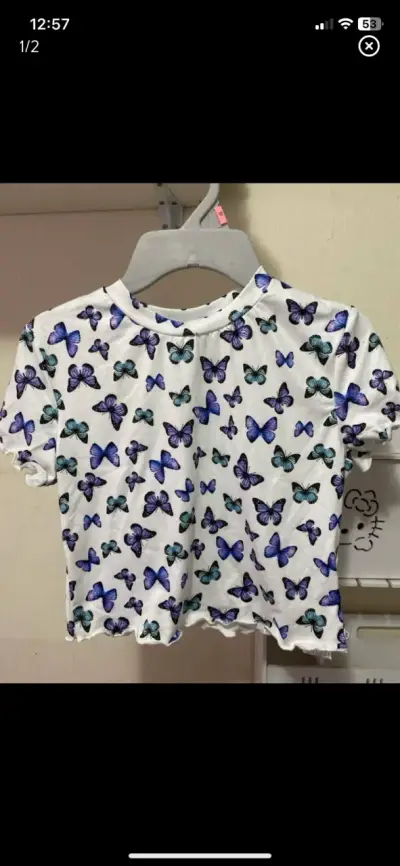 Polera blanca con estampado de mariposas para niña - miniatura 1