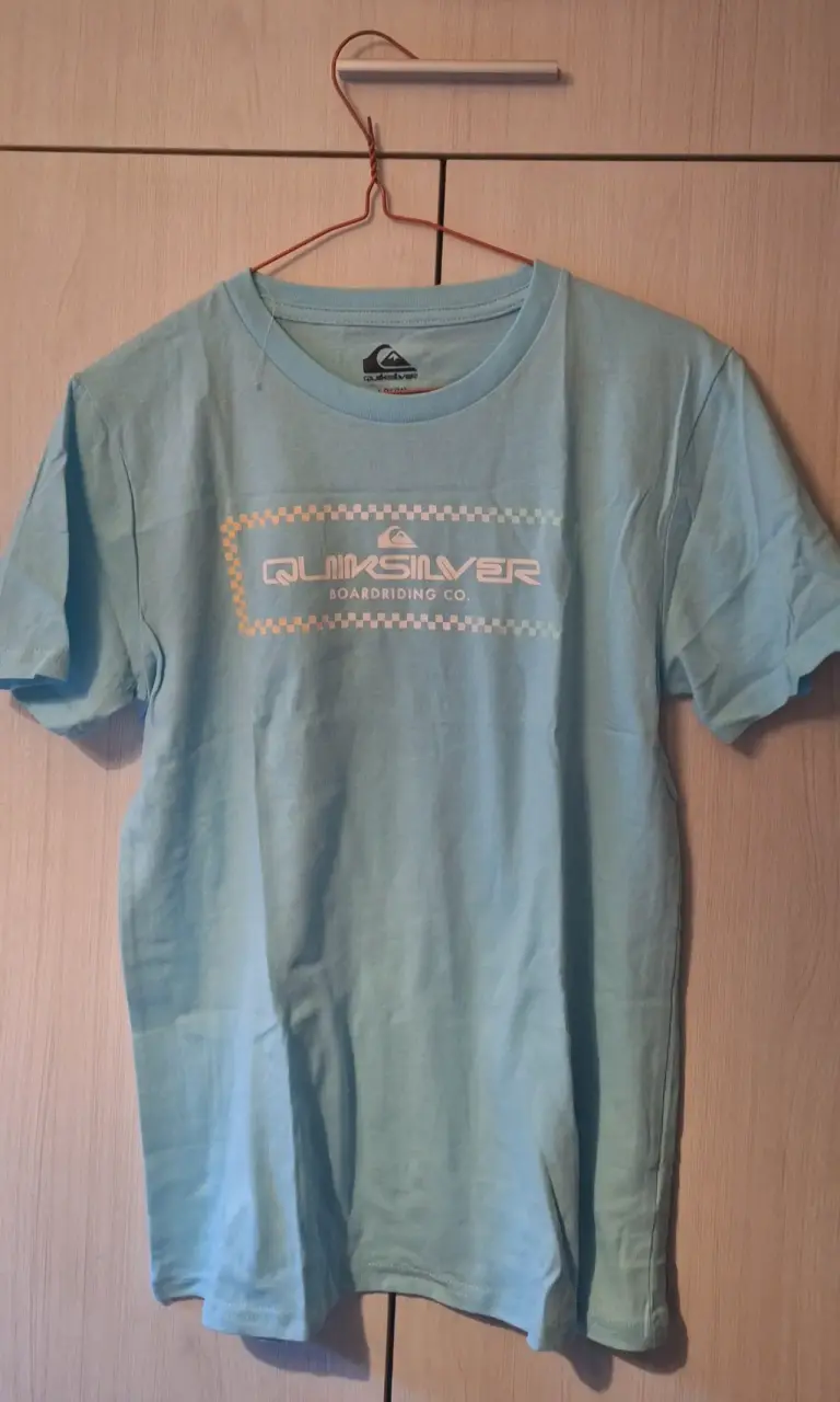 Polera Quiksilver celeste talla 14-16