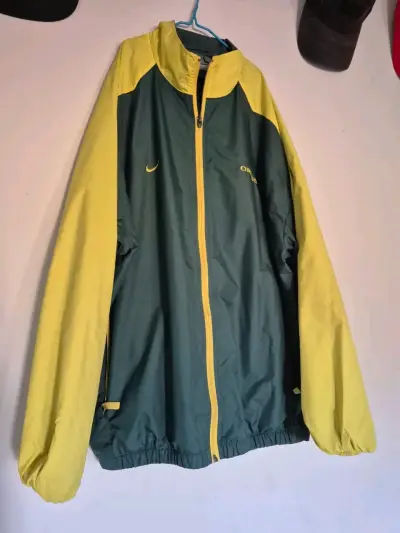 Chaqueta deportiva Nike verde y amarilla - miniatura 1