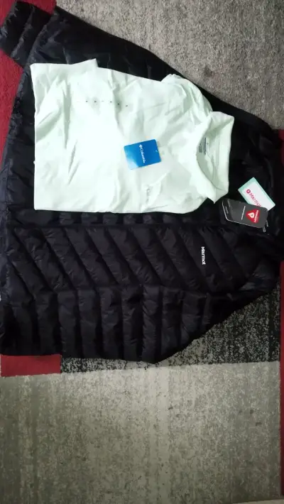 Chaqueta acolchada negra Marmot nueva - miniatura 1