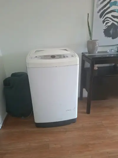 Lavadora automática de carga superior usada - miniatura 1