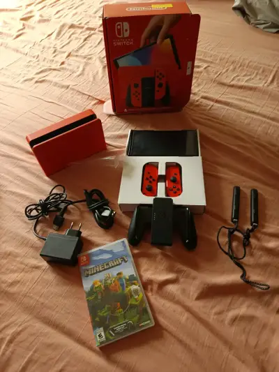 Nintendo Switch con juego Minecraft y accesorios - miniatura 1