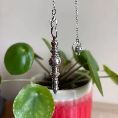 Péndulo de metal para radiestesia - miniatura 1