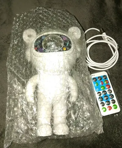 Proyector LED astronauta con control remoto - miniatura 2