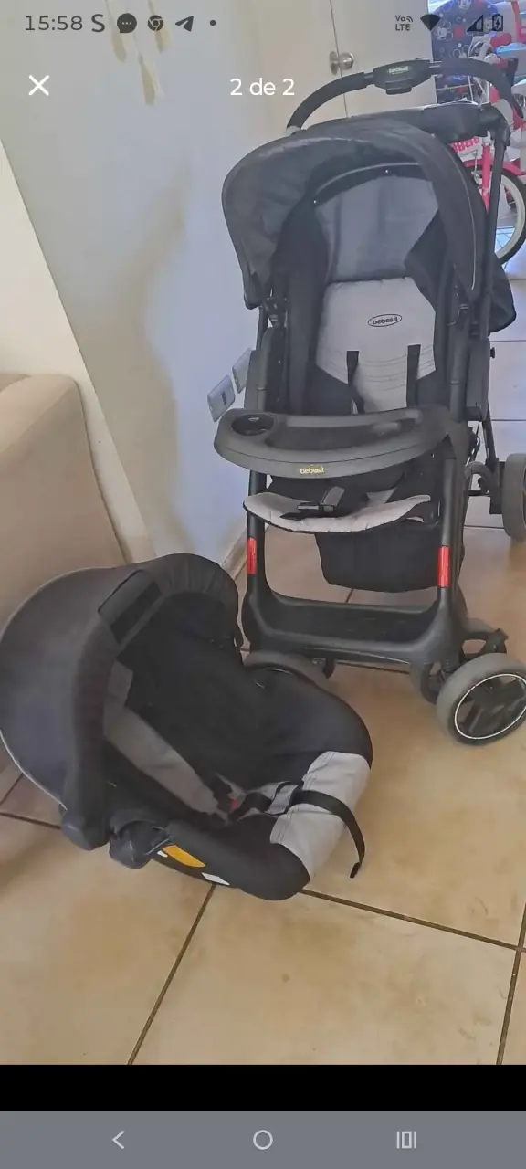 Coche de bebé negro con capota ajustable - 2