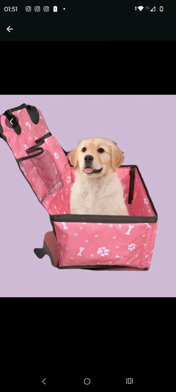 Transportadora de mascotas rosa con diseño de huellas