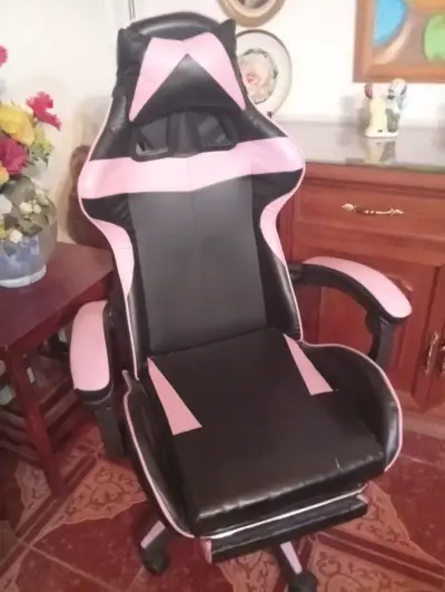 Silla gamer ergonómica negra y rosada - miniatura 1