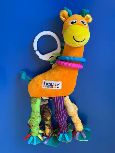 Juguete de peluche Lamaze jirafa para bebé - miniatura 1